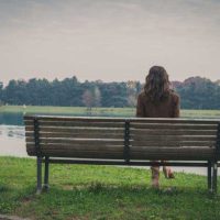 Woman On Bench